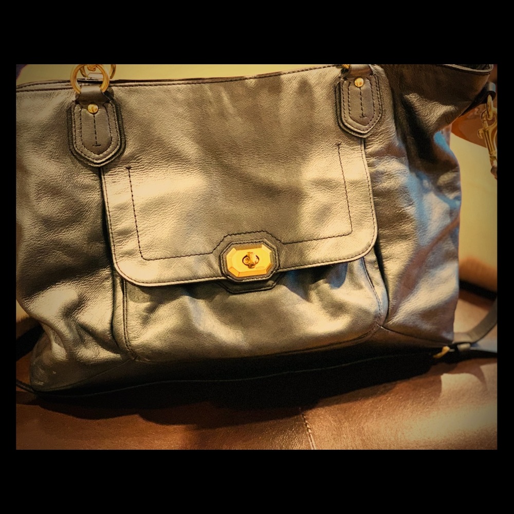 Coach bag, can wear cross body too.